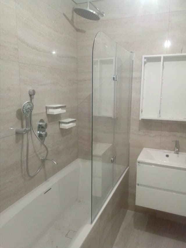 Укладка плитки в ванной с душем