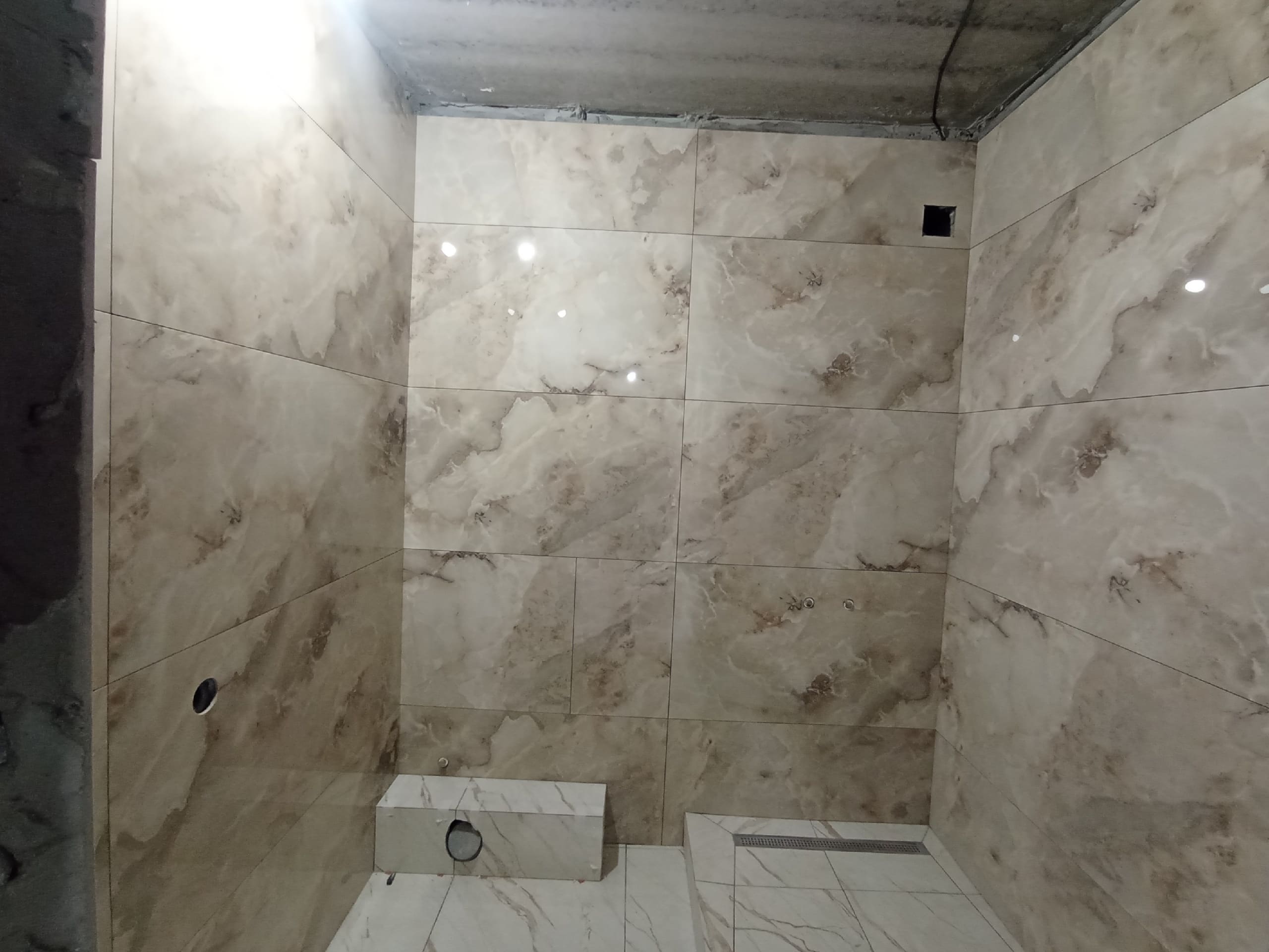 Укладка плитки в ванной и санузле